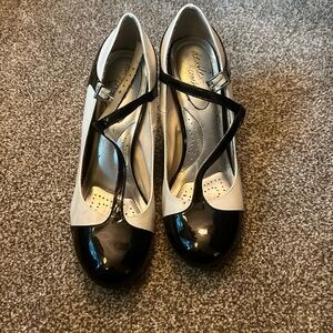 High heel saddle shoes well worn